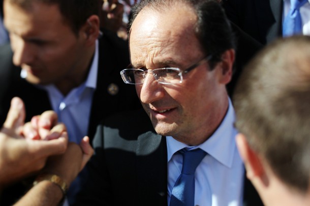 Francois Hollande shakes supporters hands