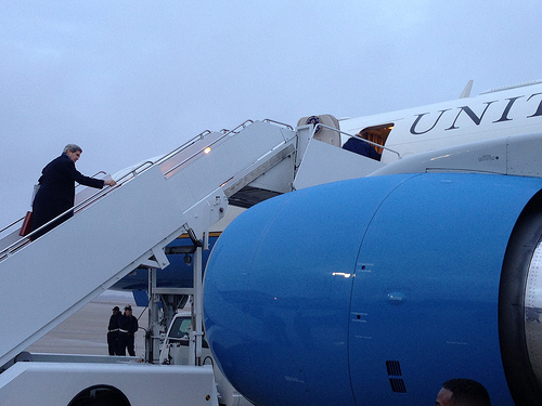 John Kerry boarding plane for Europe and Middle East