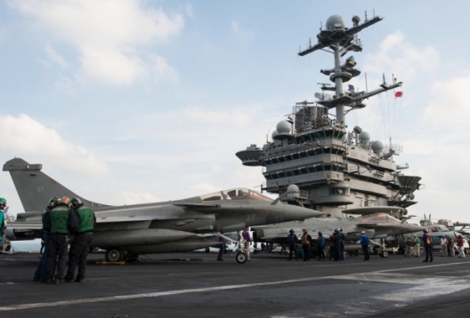 French Rafales jets refuel on the deck of the USS Harry S. Truman