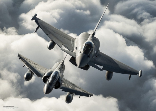 RAF Typhoon and French Mirage flying together