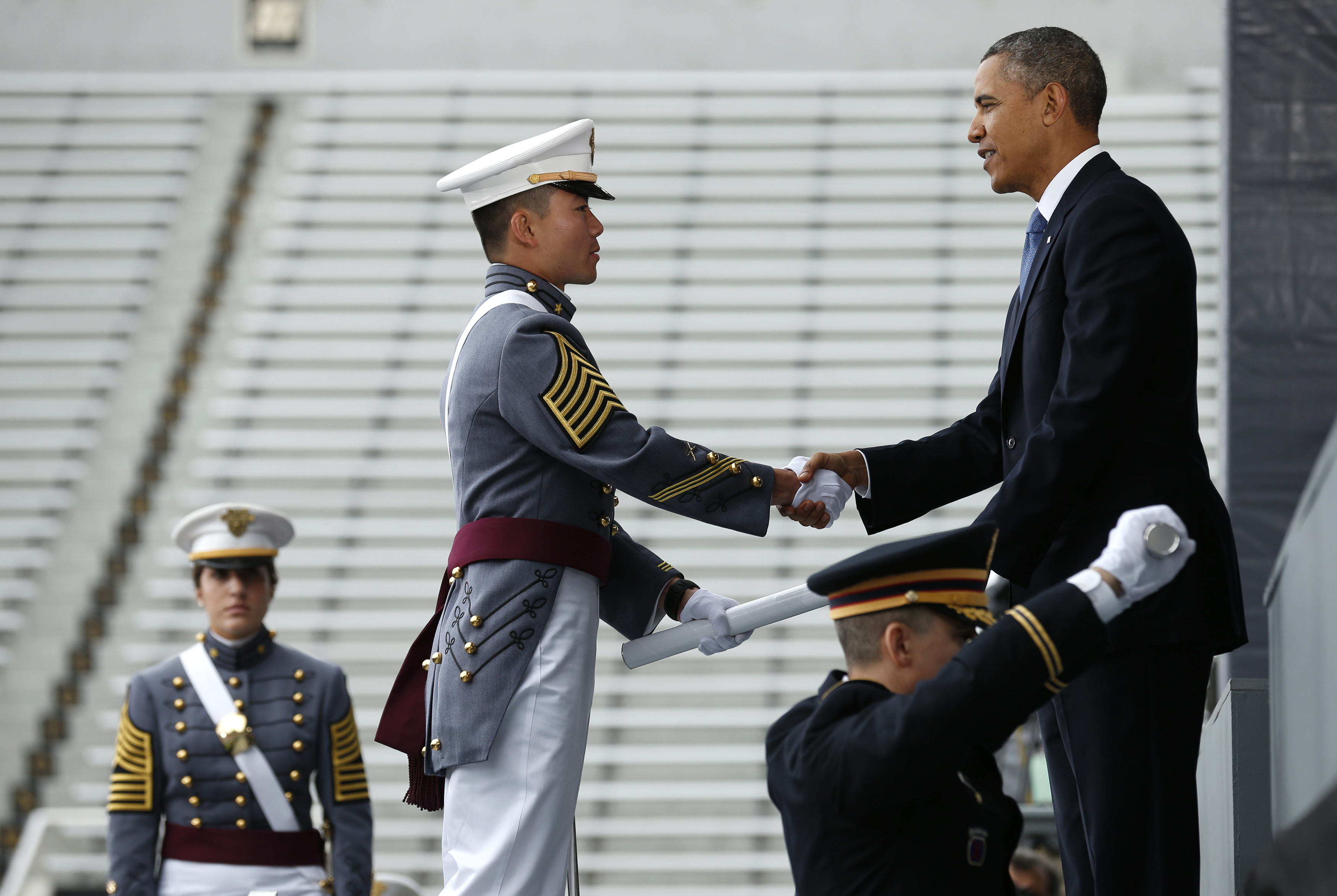 President Barack Obama hands a diploma to one of about 1,000 graduating cadets at the U.S. Military Academy at West Point, New York, on May 28. Obama’s commencement address is one of several the White House plans to lay out his foreign policy vision for the remainder of his term in office. REUTERS/Kevin Lamarque