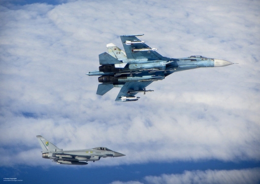 A Sukhoi Su-27 Flanker and an RAF Typhoon fighter jet, June 17, 2014