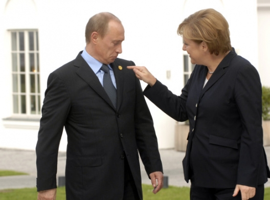 Russian President Vladimir Putin and German Chancellor Angela Merkel, June 6, 2007