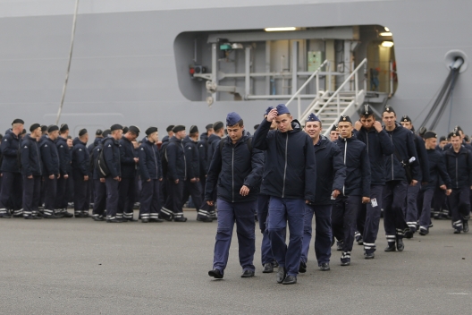 Russian sailors in front of the Mistral-class helicopter carrier Vladivostok, Nov. 25, 2014