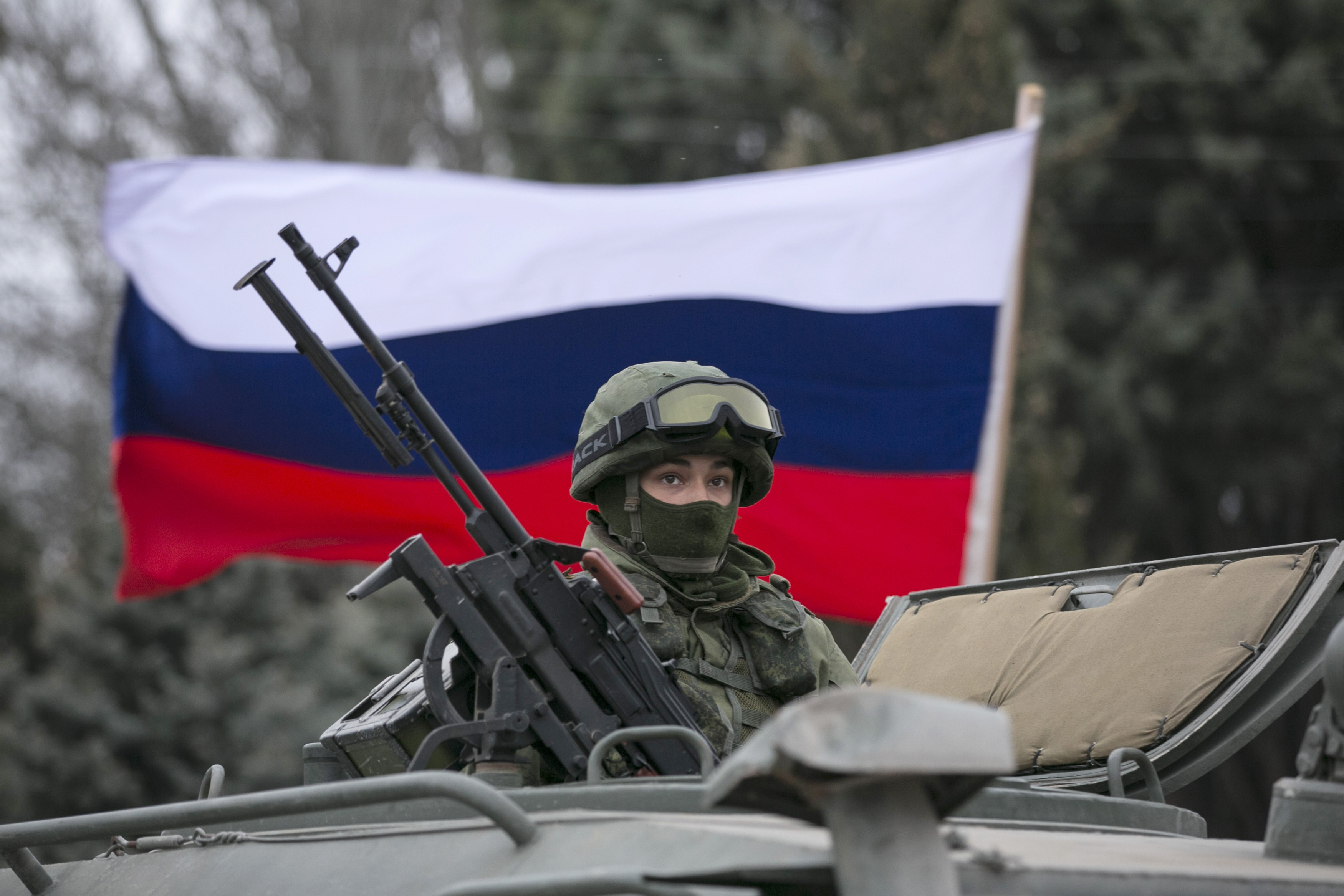 russian soldier war hero with a flag against the