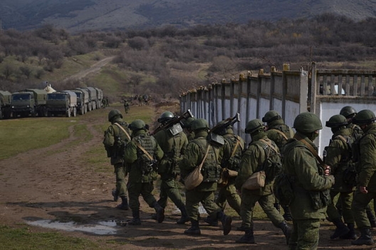 "Little green men" after seizing military base in Crimea, March 9, 2014