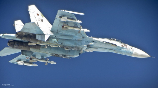 A Russian Su-27 Flanker jet photographed from an RAF Typhoon, June 17, 2014
