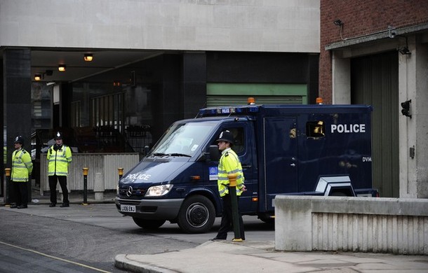 Britain charges 9 of 12 arrested in terror plot