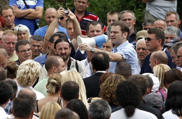 Kosovo, Serbia reach border deal, local Serbs object