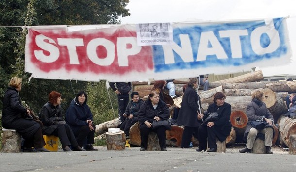 Serbs stop NATO removing roadblocks in north Kosovo