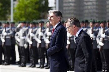 UK urges Germany to pull its weight more on defense