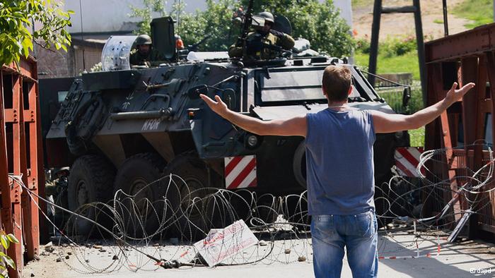 Serbs clash with NATO troops in northern Kosovo