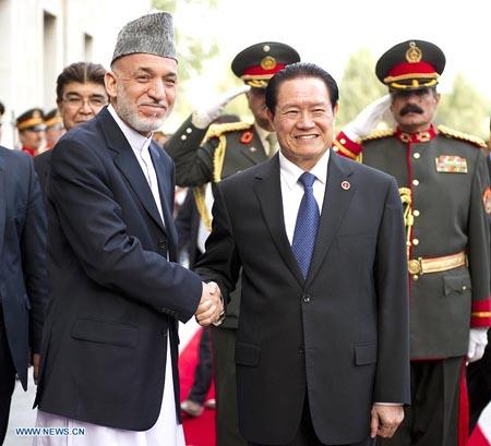 Top China official visits Afghanistan, signs security deal