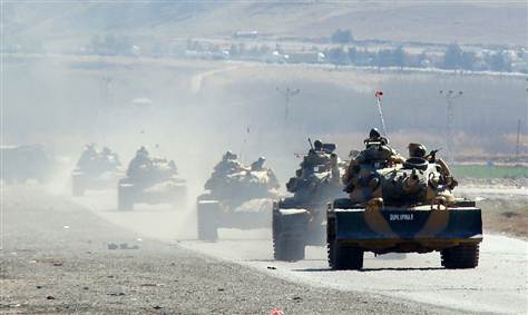 Turkey deploy tanks and missile defense assets to border as clashes with Syria continue