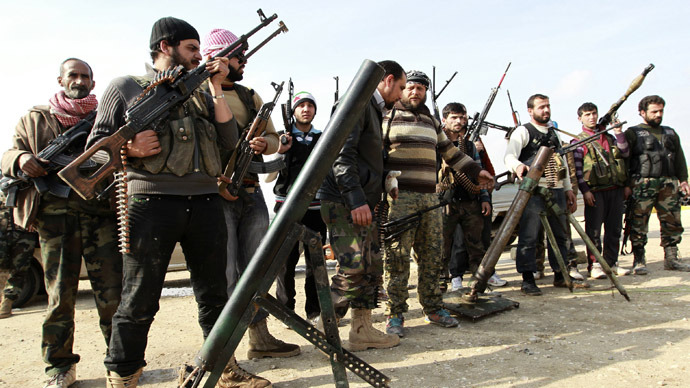 U.S., British, and French soldiers training Syrian rebels in Jordan