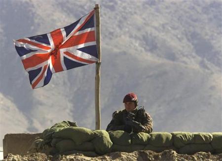 Britain risks NATO pledge if defense budget cut, panel says