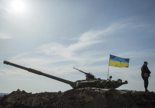 Soldier and tank near border with Russia