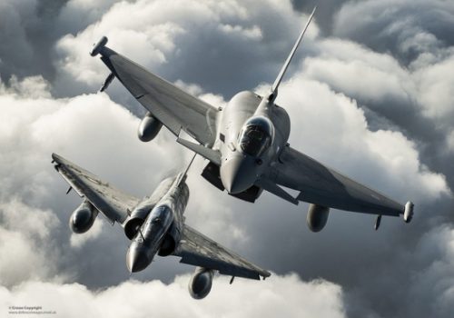 RAF Typhoon and French Mirage flying together