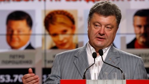 Petro Poroshenko tells reporters he will not negotiate with Russian-backed secessionist militias as a nearly complete vote count showed him winning Ukraine's presidency. REUTERS/David Mdzinarashvili