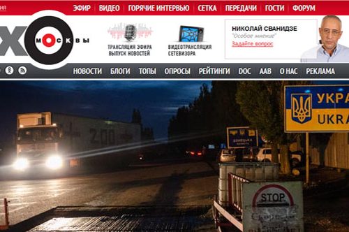 Screenshots from the Ekho Moskvy website show Maria Turchenkova's photo of the "Cargo 200" truck carrying bodies of Russian fighters across the border from Ukraine to Russia.