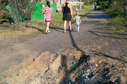 A Day in Luhansk: Crimes and Uncertainties of War