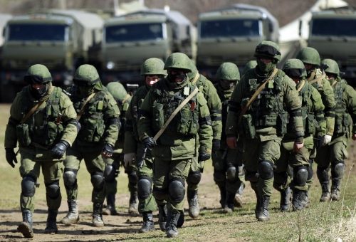 Armed men, believed to be Russians, near military base in Perevalnoye, March 17, 2014