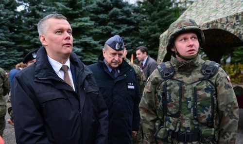 Polish Defense Minister Tomasz Siemoniak with members of the Warsaw Armored Brigade, Oct. 10, 2014