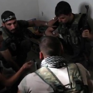 Photo: FSA soldiers hold a planning session during the Battle of Aleppo, October 2012. Voice of America News, Scott Bobb reporting from Aleppo, Syria.