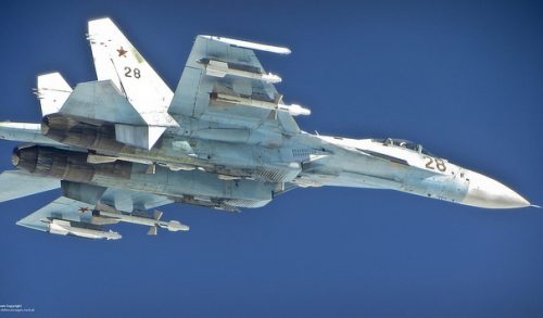 A Russian Su-27 Flanker jet photographed from an RAF Typhoon, June 17, 2014