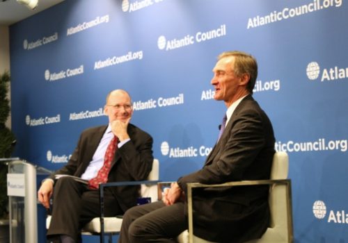 Roger Krone (right) discusses Leidos and the industry marketplace with Steven Grundman (left).