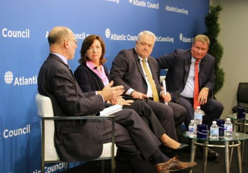 Steve Grundman moderates a panel of industry leaders, including Barbara Humpton of Siemens USA, Andy Hove of AM General, and Brad Feldmann of Cubic Corporation (L-R).