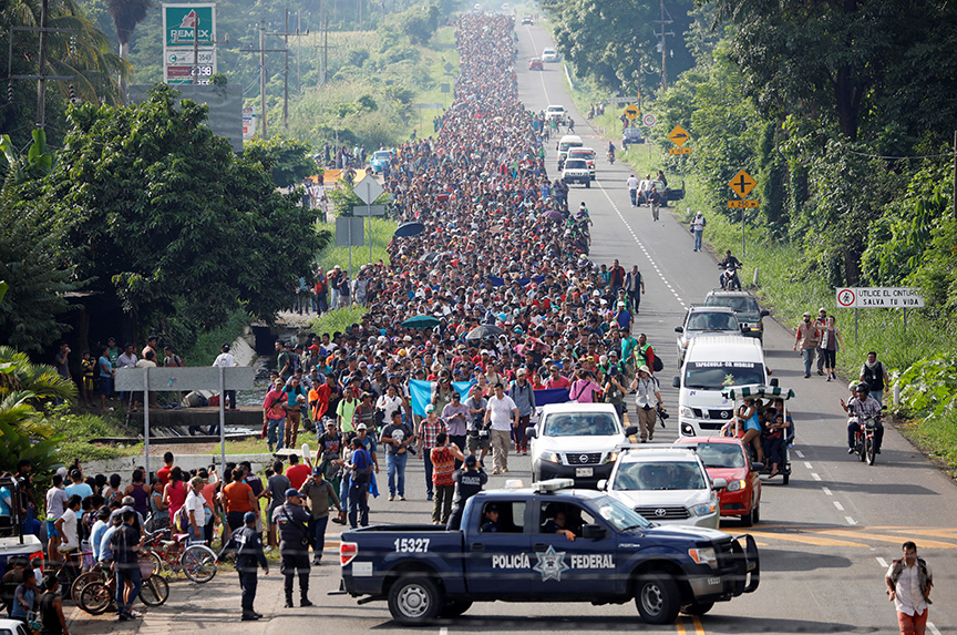 Why is a caravan of Central American migrants fleeing to the United States?