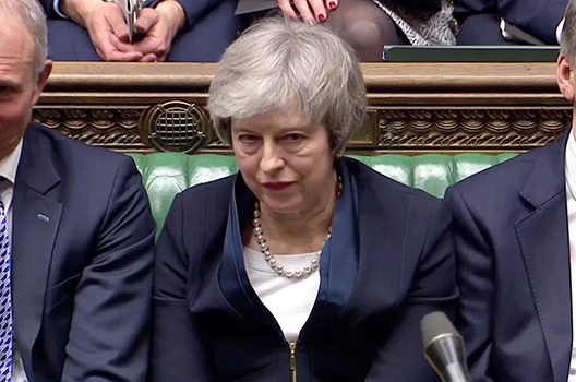 May’s Brexit deal stumbles in Parliament. Now she is fighting to save her government.