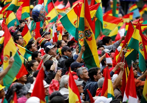 A tale of two flags: How Bolivia’s racial divide is shaping its political crisis