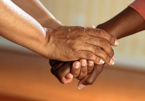 gtc clasped hands together for public good