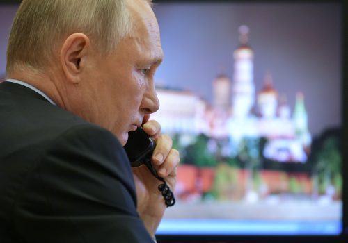 Russian President Vladimir Putin work before a meeting on the situation with the spread of the coronavirus disease (COVID-19) in Russia, outside Moscow