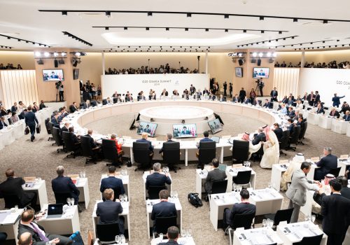 World leaders gather around a conference table