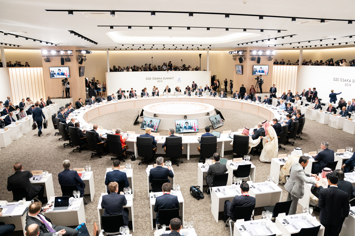 World leaders gather around a conference table