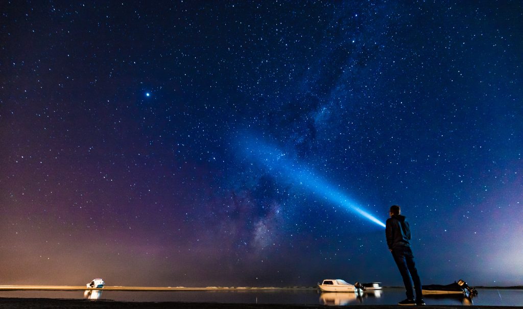 gtc searchlight shining into the night sky