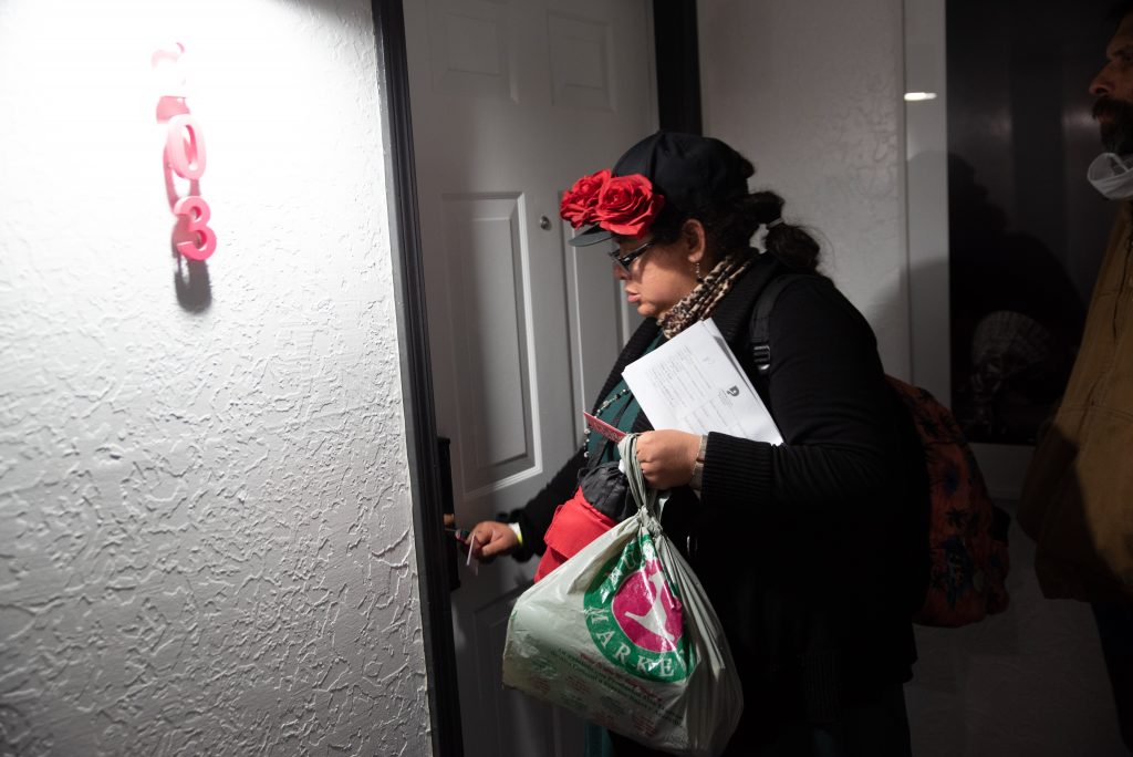 Person entering front door