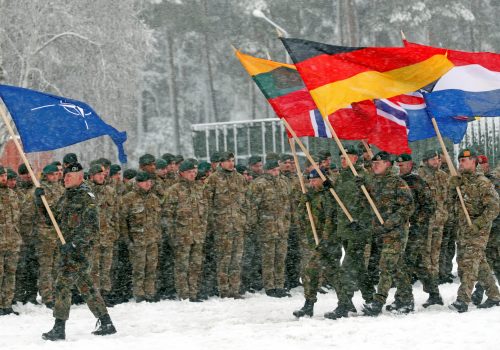 Soldiers holding flags