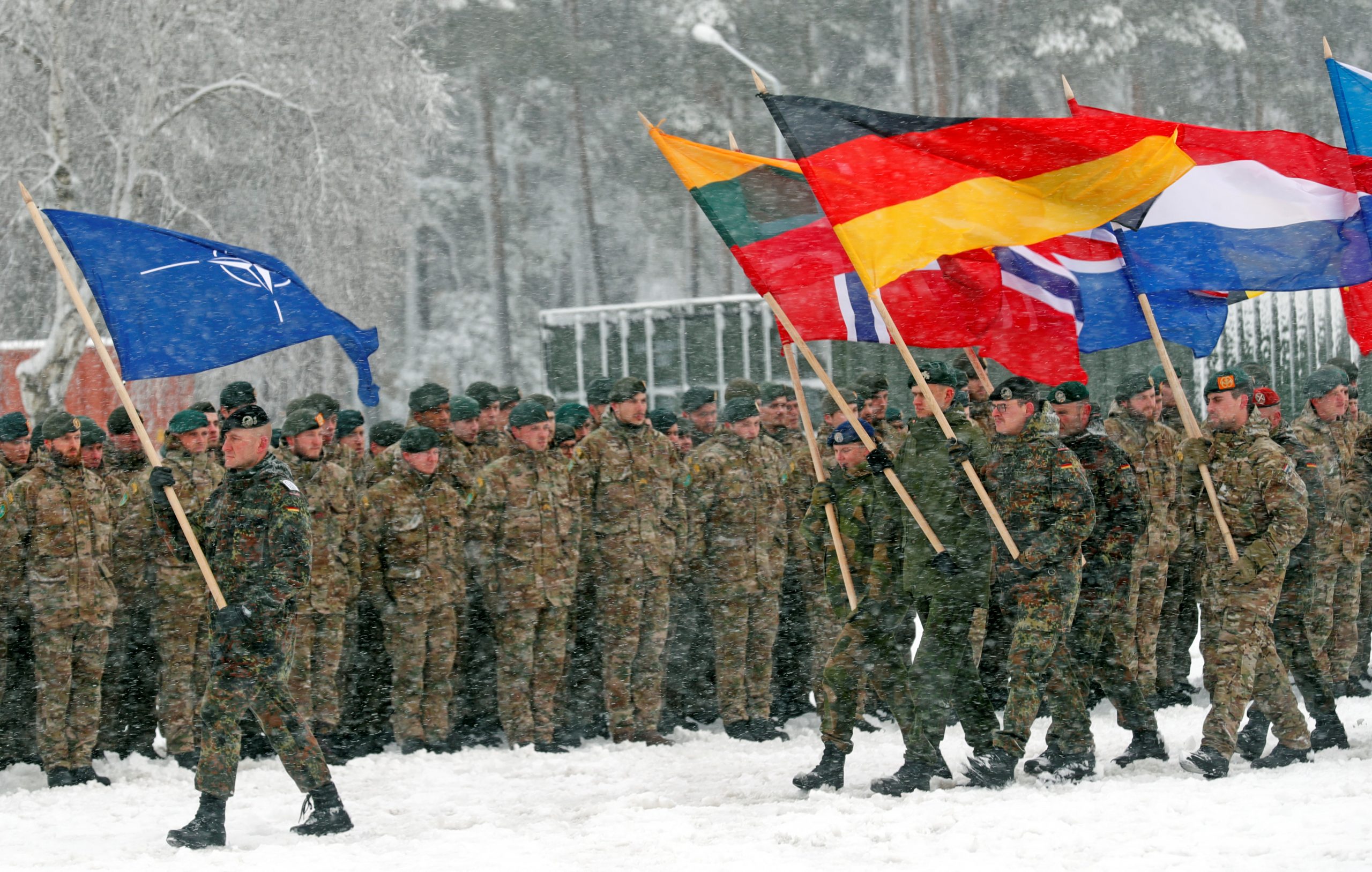 Soldiers holding flags