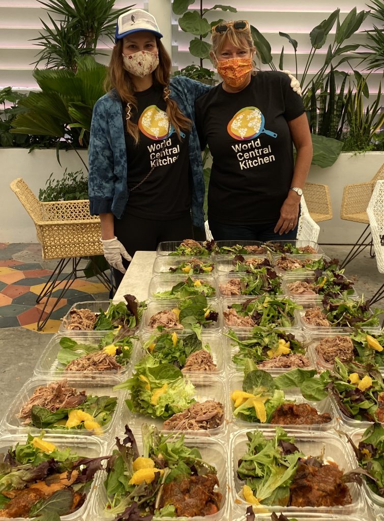 World Central Kitchen volunteers preparing food for a Farm Share food drive in Miami, FL.