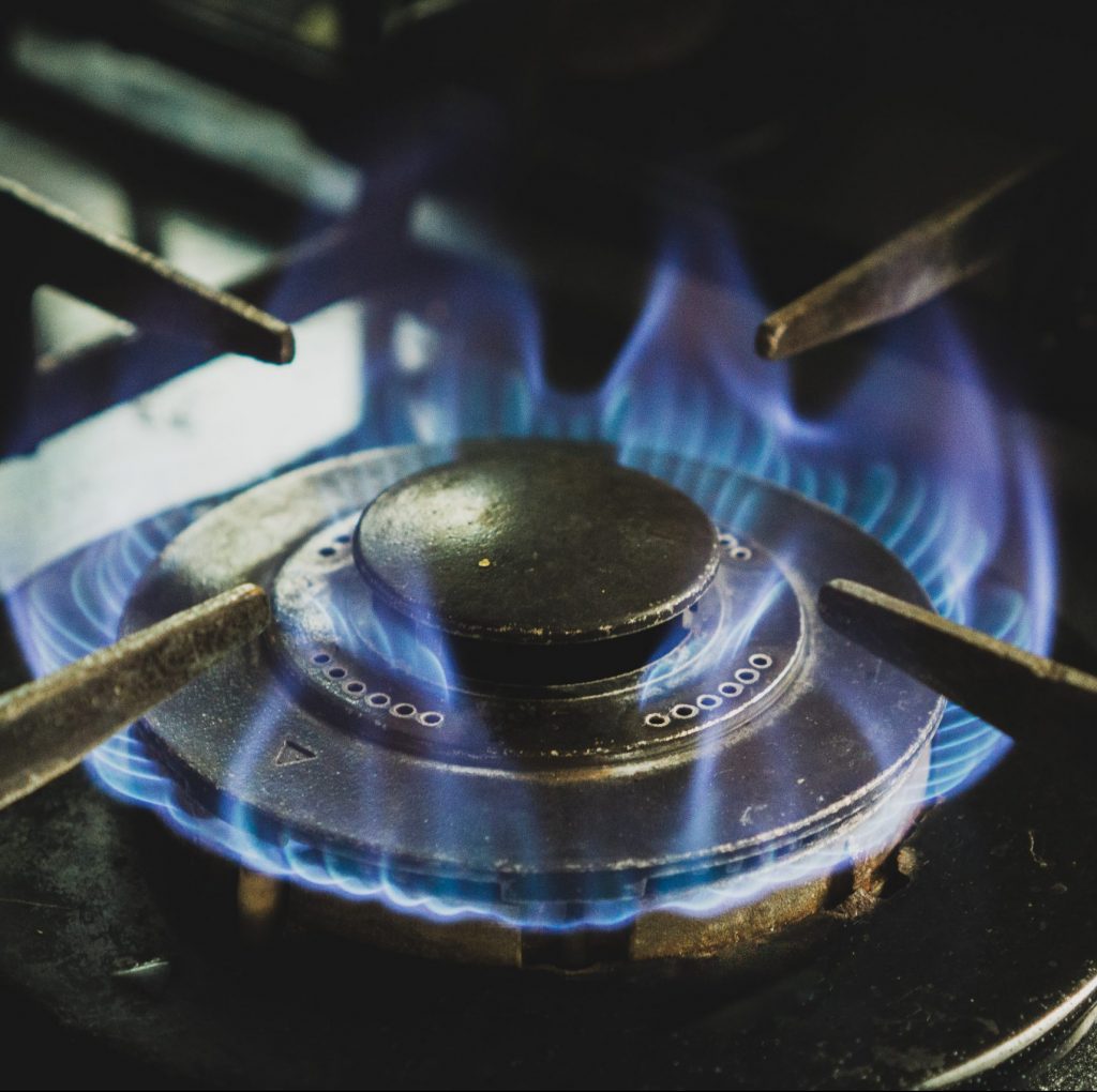 A gas stove aflame
