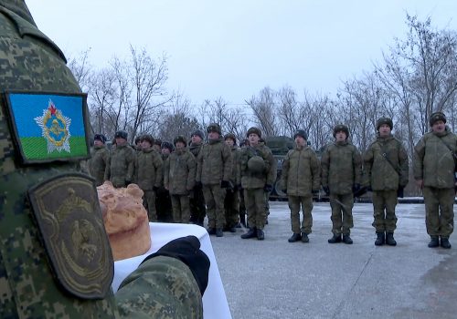 Ukraine faces mounting encirclement as Russian troops enter Belarus