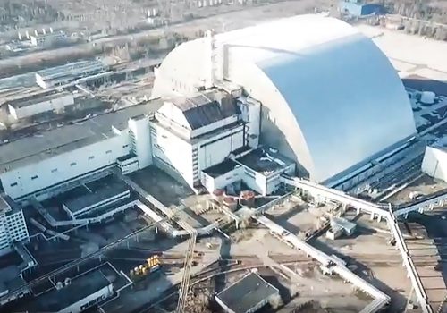 PRIPYAT, UKRAINE  FEBRUARY, 2022: Pictured in this video screen grab is the Chernobyl Nuclear Power Plant. Russian Airborne troops and the Ukrainian National Guard are providing security at the nuclear power plant. An agreement has been reached with servicemen of a separate battalion of the National Guard of Ukraine to jointly provide security at the units, the confinement and the storage facility for spent nuclear fuel. Chernobyl Nuclear Power Plant staff continue to monitor the radiation levels and work at the nuclear power plant as normal. Video grab. Best possible quality. Russian Defence Ministry/TASS