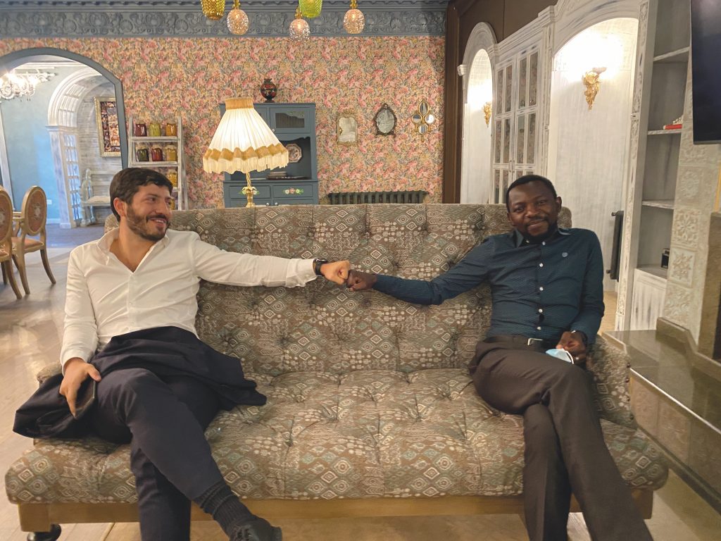 Two men on a couch
