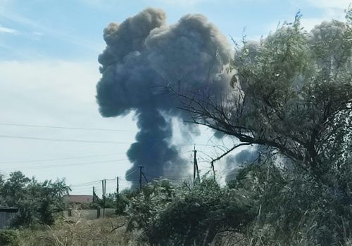 Smoke rises after explosions were heard from the direction of a Russian military airbase near Novofedorivka, Crimea, August 9, 2022. (Source: Reuters)