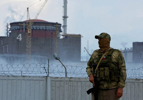 A Russian soldier stands guard near the Zaporizhzhia Nuclear Power Plant, August 4, 2022. (Source: REUTERS/Alexander Ermochenko/File Photo)