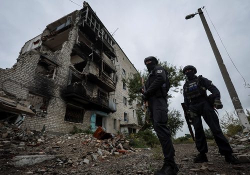 Ukrainian police patrol the town of Izyum, recently liberated by Ukrainian Armed Forces, September 14, 2022. (Source: Reuters/Gleb Garanich)